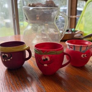 Vintage 1960’s Kool-aide clear pitcher and 3 kool-aid plastic mugs